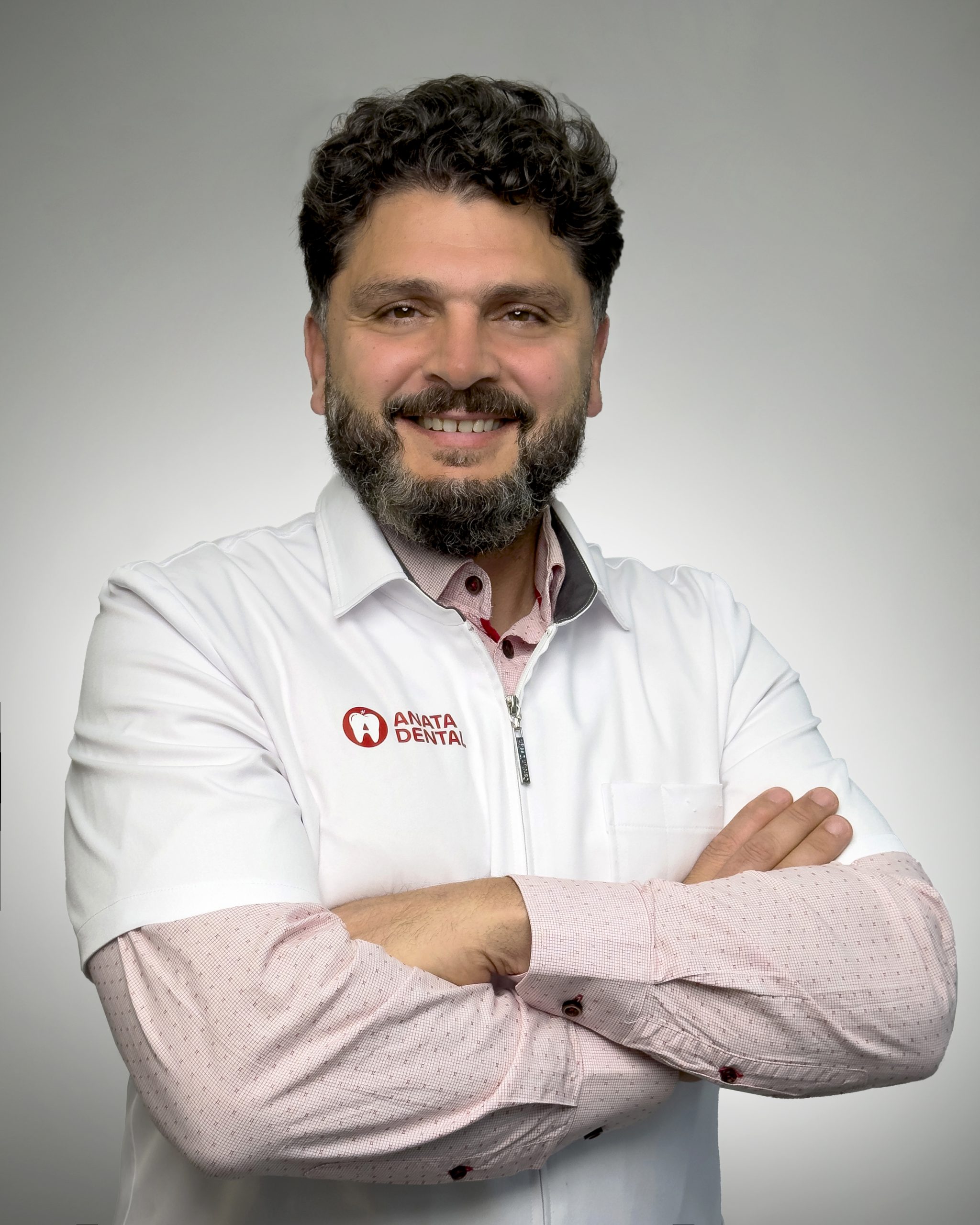 Dr. Samhat, dentist at Anata Dental Clinic in Kanata, Ottawa, providing gentle family and cosmetic dental care